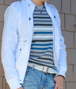 White jacket and a gray blue striped t-shirt