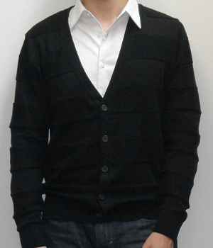 A black cardigan over a white shirt