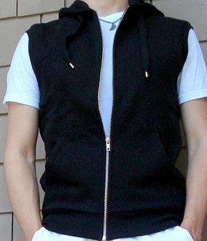 Black Zip Up Hooded Vest over a White Tee