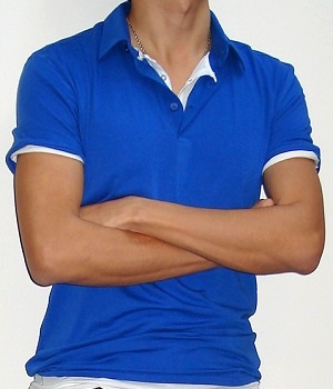 A blue collared polo shirt over a white collared polo shirt