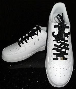 white sneakers with black laces