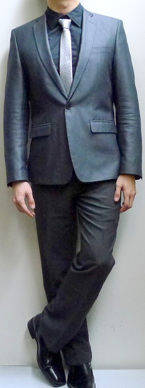 Men's Dark Gray Blazer Black Shirt Light Gray Striped Necktie Gray Pants Black Loafers